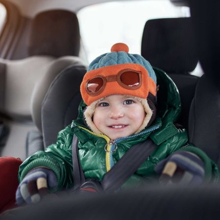happy-baby-boy-sitting-in-baby-car-seat-2022-01-24-22-35-33-utc-1.jpg